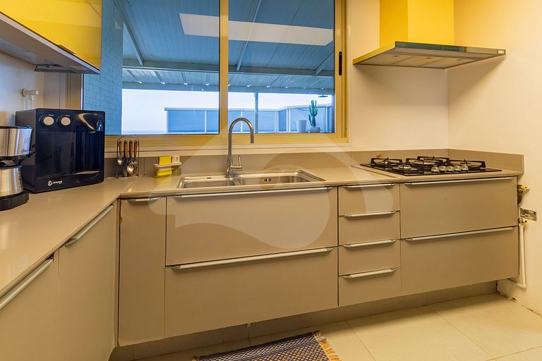 Vista da Praia: Duplex de Luxo com Espaço Gourmet